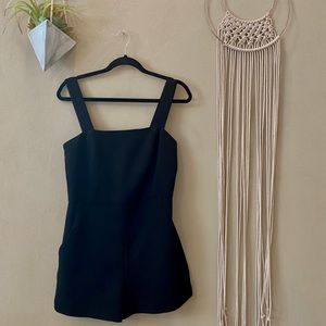 Black jumpsuit.
